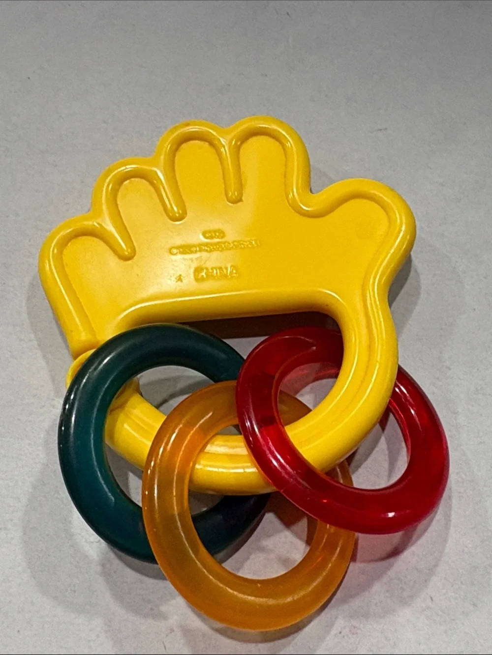 Vintage 1998 Fisher-Price Yellow Hand Rattle with Red, Orange and Green Rings